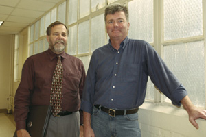 Metropolitan College Associate Professors Robert Cadigan (left) and Tom Nolan are actively involved in the schools online criminal justice program. Photo by Kalman Zabarsky