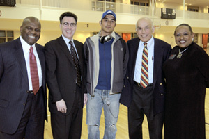 Kenneth Elmore, dean of students (from left), Joseph Mercurio, executive vice president, senior Remie C. Ferreira (CAS05), Aram Chobanian, president ad interim, and Katherine Kennedy, director of the Howard Thurman Center, celebrate the March 21 opening of the Fitness and Recreation Center for seniors, who had exclusive access to the facility several days before the rest of the University. Photo by Kalman Zabarsky