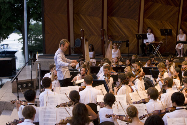 BUTI Young Artists Orchestra, conducted by Paul Haas, performing at the Hatch Memorial Shell