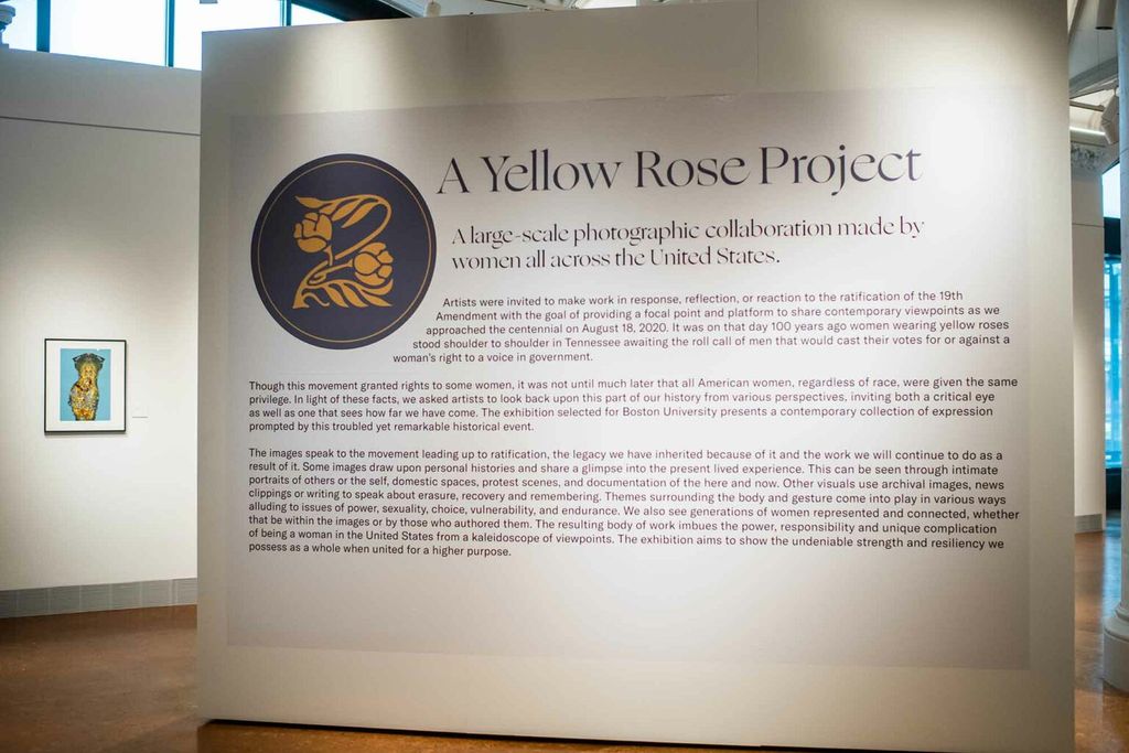 The title wall at the Faye G., Jo, and James Stone Gallery displays the curatorial statement for the show, A Yellow Rose Project. 