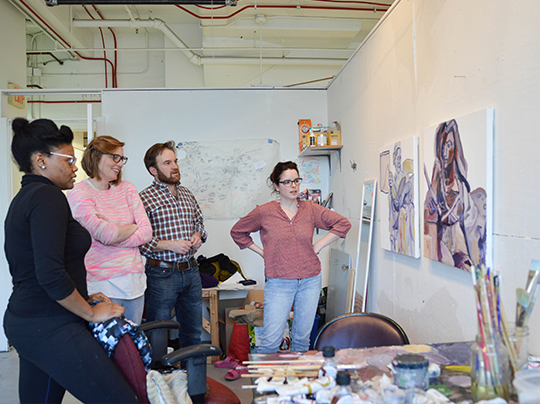 MFA Painting students discuss work in a critique setting