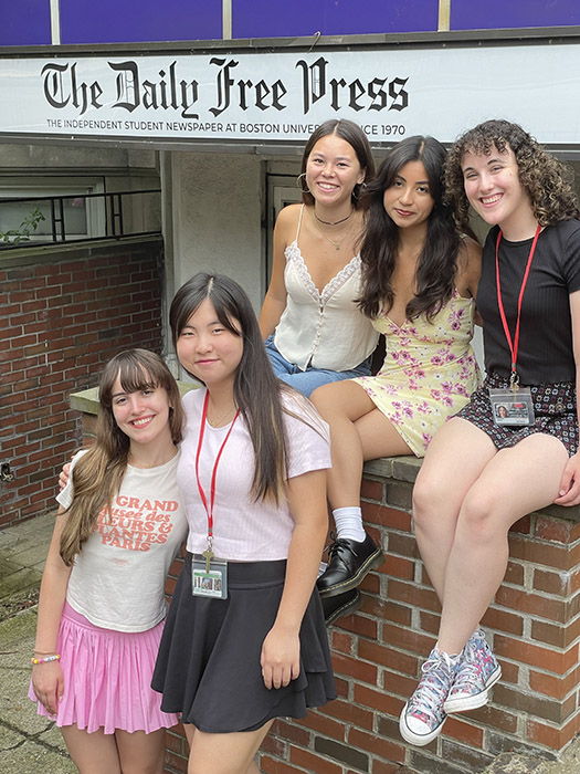 From left to right: Cami Culbertson, Cindy Cui, Sienna Bevan, Samantha Gamero, and Maggie LeBeau pose in front of the Daily Free Press office on Comm. Ave. Photo by COM.