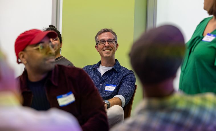 Eric Gordon smiling in crowd.