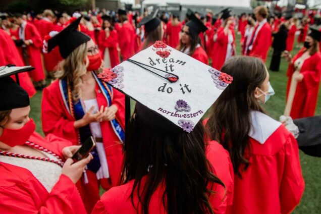 View of a decorated mortarboard that reads 'Dream it, Do it. Boston, Northwestern'.