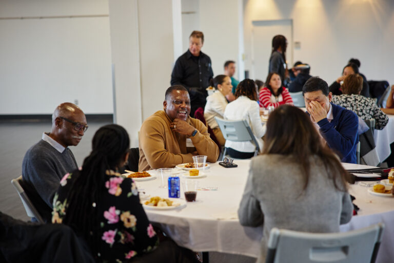 Faculty and Staff mingling at the faculty & staff of color luncheon