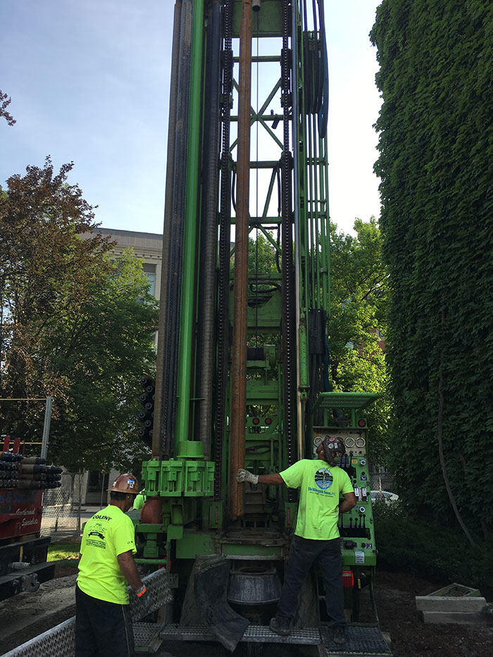 Drilling to bedrock and setting casing at geothermal well location GT-9