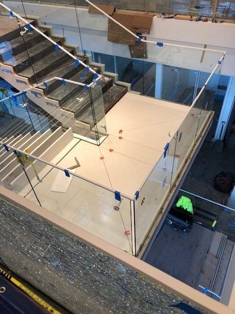 Installation of terrazzo landings and treads.