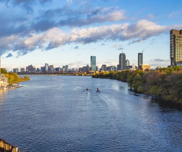 View of Charles River with the John Hancock building and BU Law Building being prominent