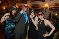 Masquerading revelers at the Goldman Gala