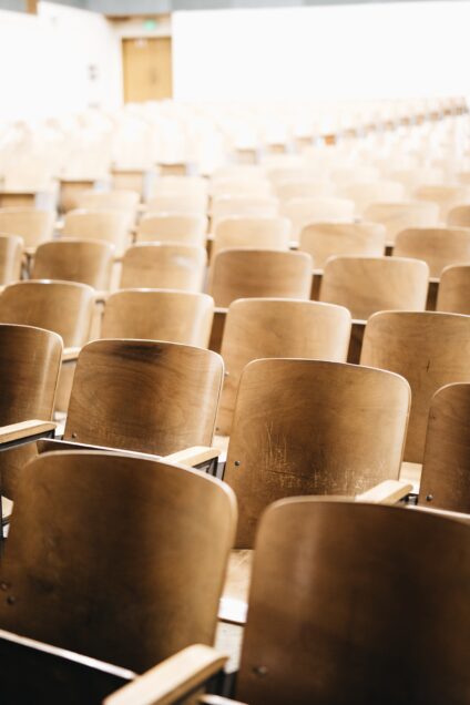 Classroom seats inside a empty auditorium