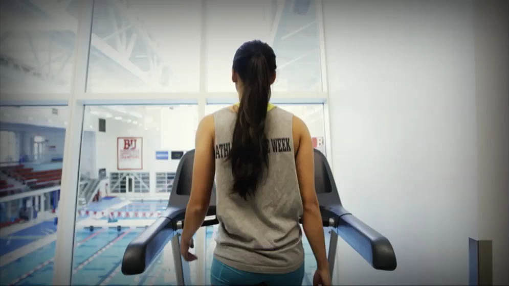 view from behind a person walking on a treadmill