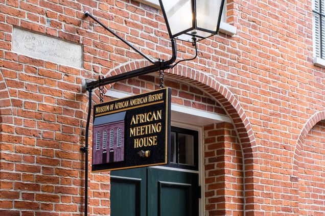 The sign that hangs outside the African Meeting House