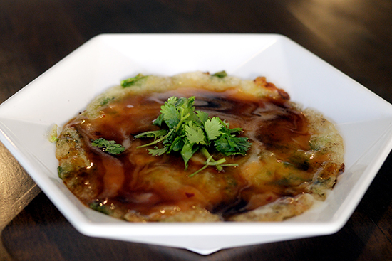 The oyster pancake—whole oysters fried in a potato-starch batter—is a popular Taiwanese street food favorite.