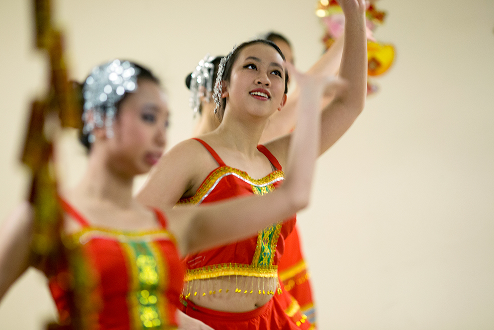 The Wang YMCA Dance Troupe, including Beverly Ng (center), performs at a Chinese New Year Celebration at the George Sherman Union. Photo by Alexandra Wimley (COM '17)