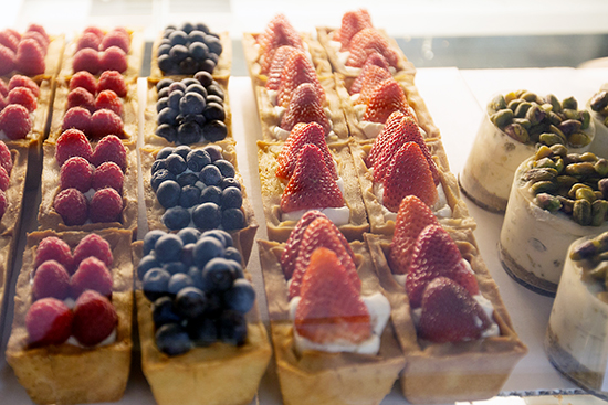 Tatte’s is famous for its fruit tarts and pistachio crush cake—pistachio mousse on pistachio crust with caramel coated pistachios.