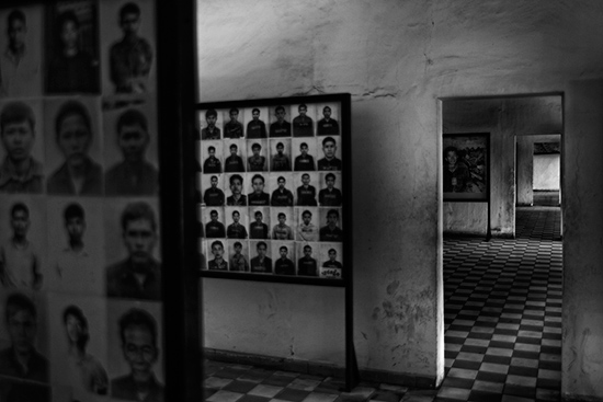 Images of the Khmer Rouge genocide in Cambodia hang in the Tuol Sleng Genocide Museum, Phnom Penh