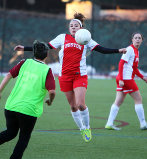 Julia Tampellini blocking ball with her body