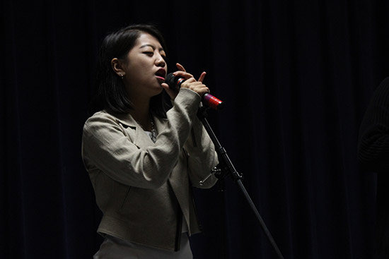 Sorian president Junehyung (Julia) Park rehearsing a number for the club’s annual spring concert.