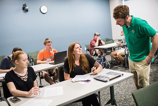 Mark Kornbleuth speaking with REU students