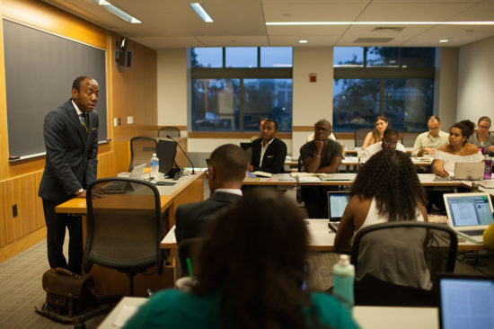 Former NAACP president Cornell William Brooks talks to students during his Boston University class titled Violence, the Vote, and Hope: An Examination of Ethics, Law and Justice Movements