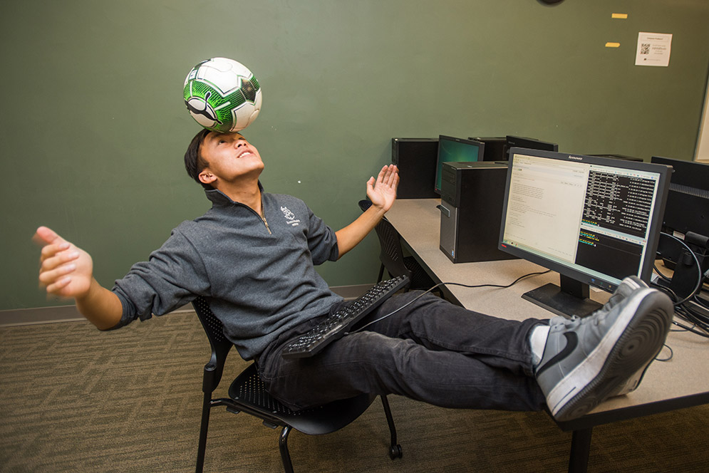 When Andrew Hoang (ENG’18) realized he was unlikely to see the field for the BU men’s soccer team, he didn’t walk away. Instead, he used the sport and the lessons it taught him to propel himself to a prominent position in the locker room and on campus. Photo by Cydney Scott