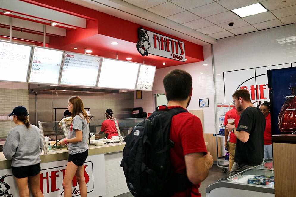 Students order food at Rhett's West restaurant at Boston University