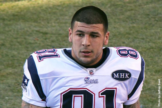 Aaron Hernandez as an NFL player with the New England Patriots