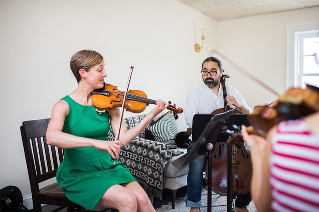 Sasha Callahan and Leo Eguchi rehearse with a local chamber music ensemble they perform with