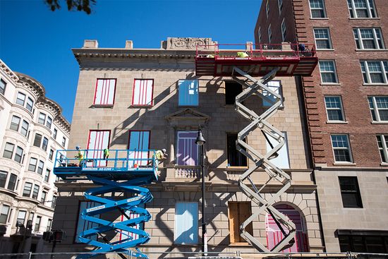 The facade of Boston University's Myles Standish Hall dorm under repair.