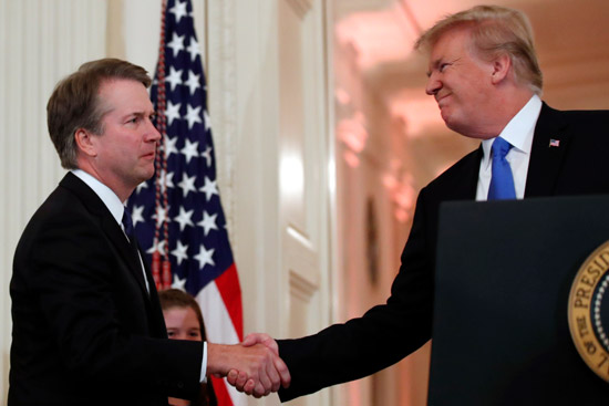 President Donald Trump shakes hands with Judge Brett Kavanaugh his Supreme Court nominee