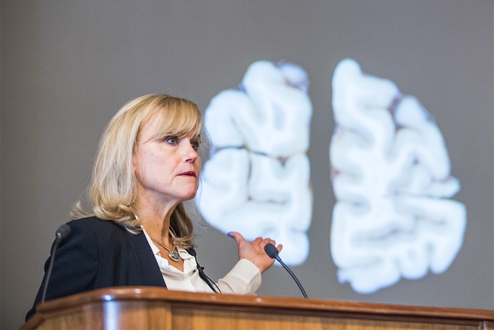 Ann McKee’s pioneering research into the degenerative brain disease chronic traumatic encephalopathy (CTE) has earned her a Lifetime Achievement Award from the Alzheimer’s Association. Photo by Jackie Ricciardi