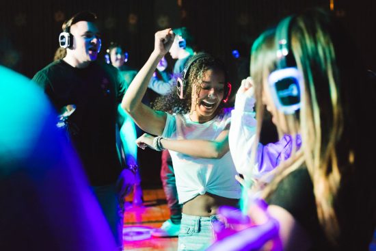 Students dance during the silent disco