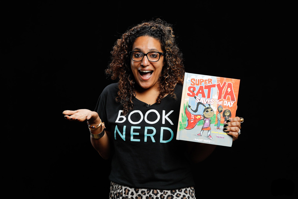 Raakhee Mirchandani holds her book Super Satya Saves the Day