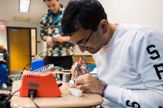 A student builds a robot
