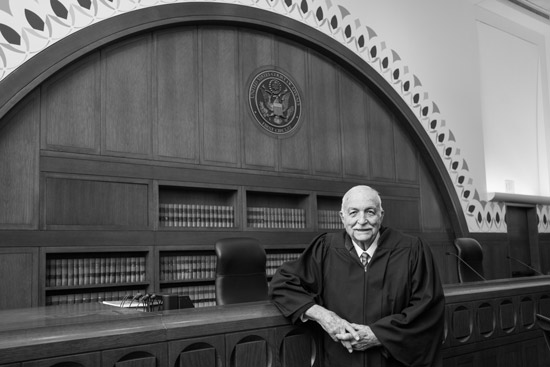 Juan R. Torruella poses in the courtroom