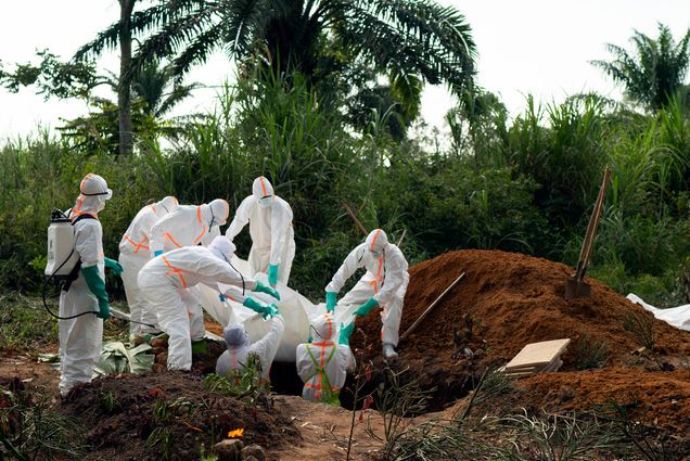 An Ebola victim is put to rest at the Muslim cemetery in Beni, Congo DRC