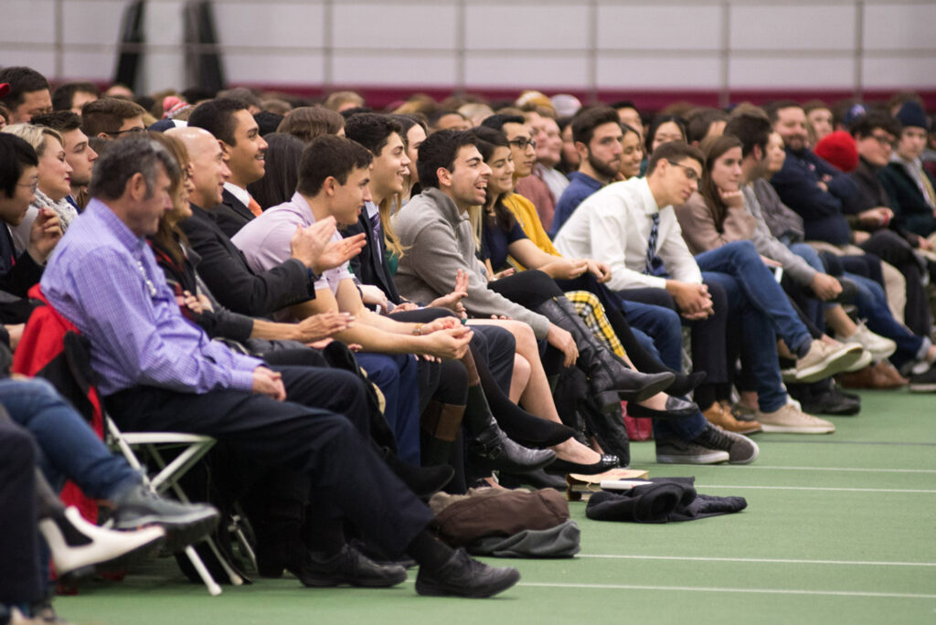 Audience members react to Ben Shapiro's speech at Boston University.