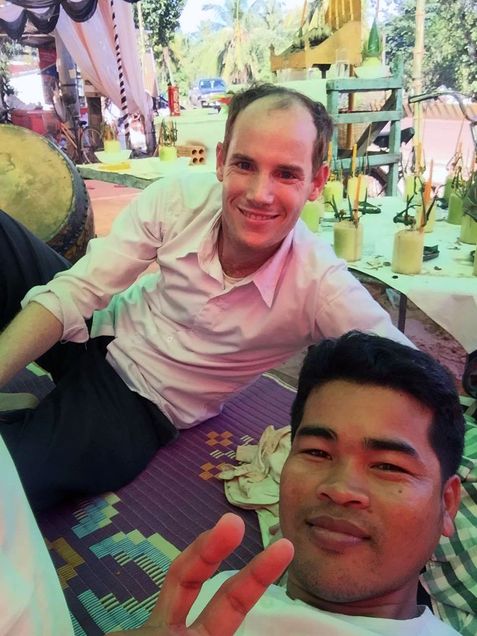 Jeffrey Dyer poses for a photo while performing music in Cambodia