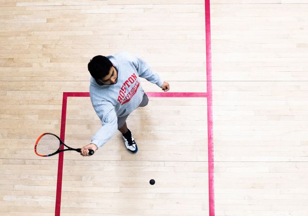 Karanjay Mahtab (CAS’22) serves a ball to begin a point during men’s club squash practice.