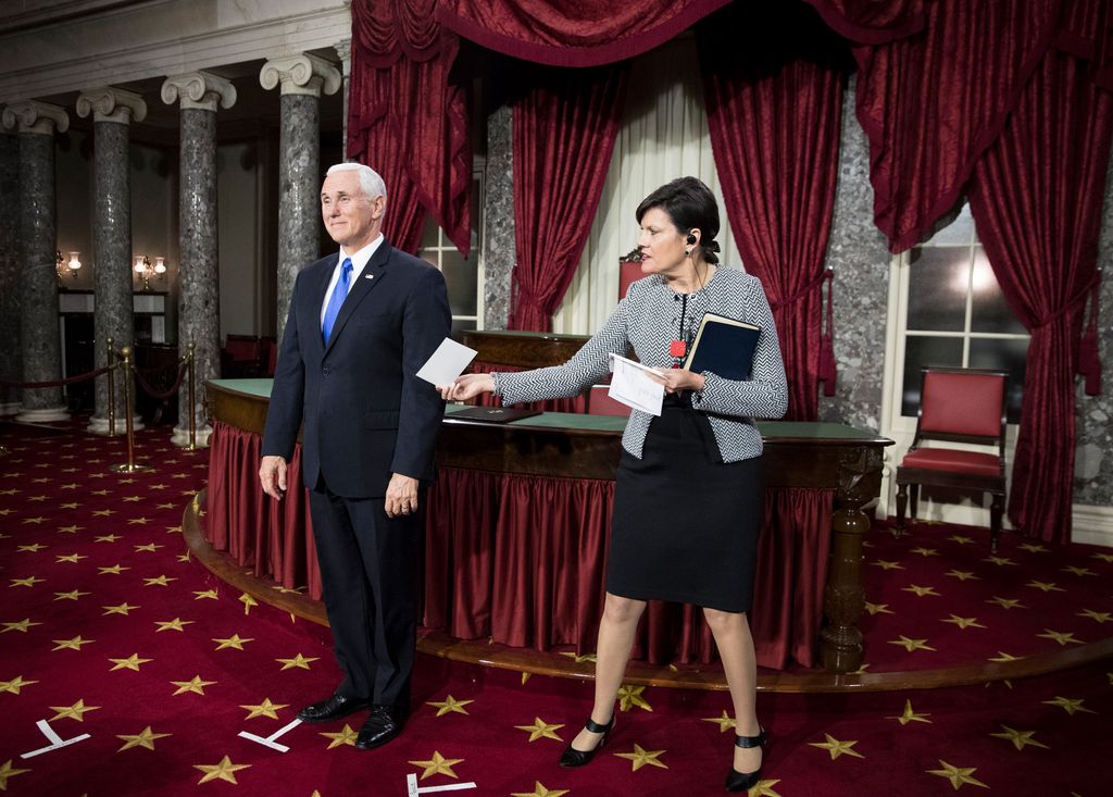 Vice President Mike Pence stands during the ceremonial swearing in of senators