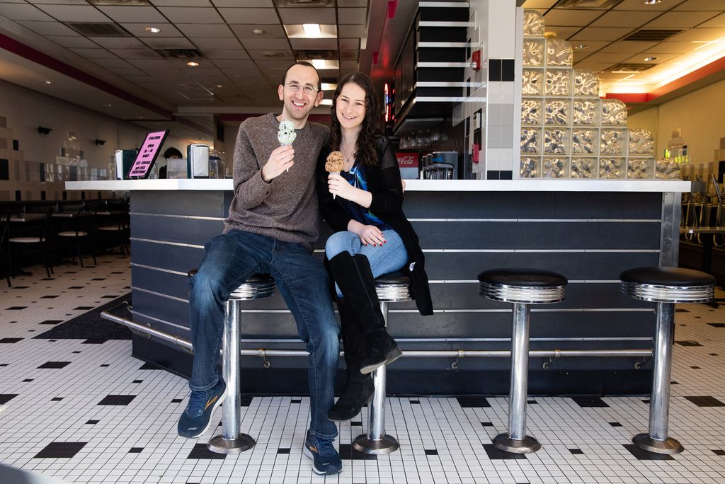 A photo of Rick Sobey (COM'12) and Felicia Gans (COM'17) at the ice cream shop in Chelmsford, Mass. that brought them together in 2016.