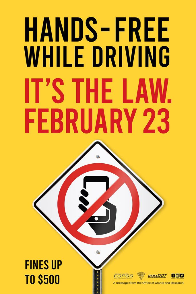 An image of a poster that reads "Hands-Free While Driving. It's the Law, February 23."