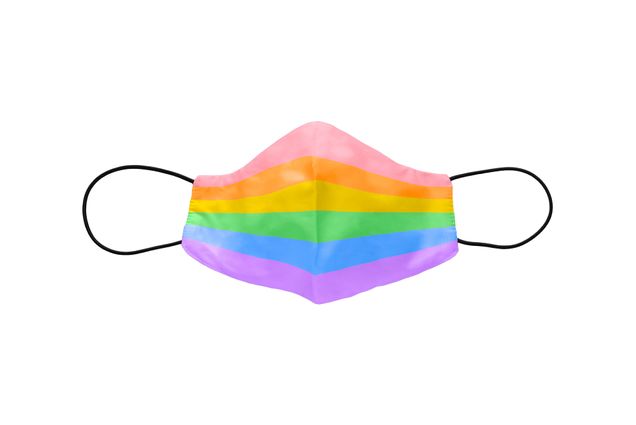 An illustration of a face mask with a rainbow pattern on it