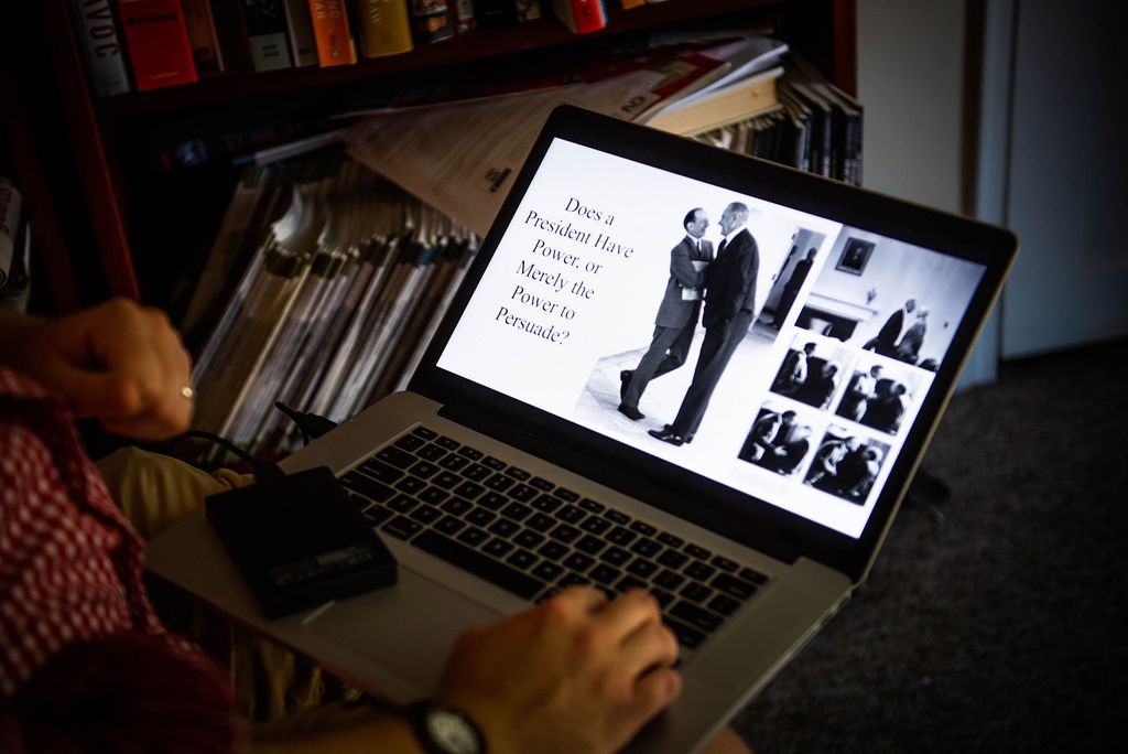 A photo of Andrew David's computer screen with a slide featuring a photo of Lyndon B. Johnson