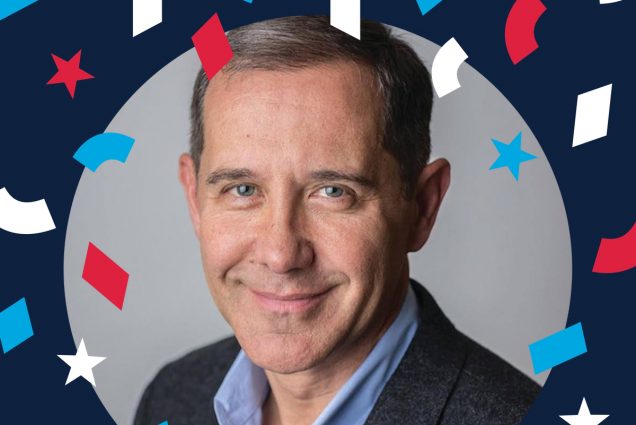 Image shows a headshot of Joe Solmonese (COM’87), CEO of the Democratic National Convention in a circle, with a dark blue border with red, white, and blue confetti around him.