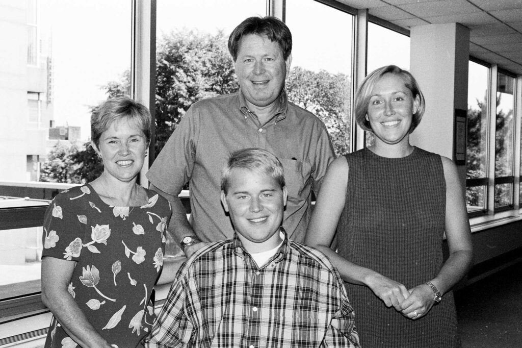 Travis Roy with his family in 1999.