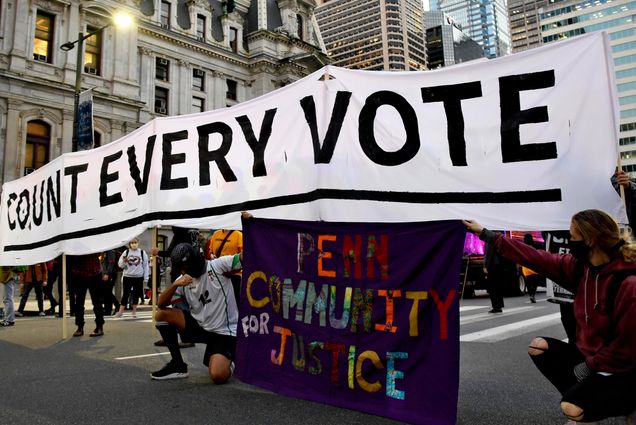 Protestors holding a sign that reads "Count Every Vote" in Philadelphia, PA on November 5, 2020