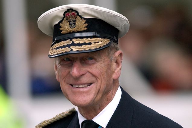 A photo of Prince Philip in dress uniform. He is smiling at the camera.