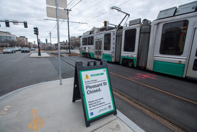 A photo of the green line b branch with a sign that says "Pleasant St. is Closed"