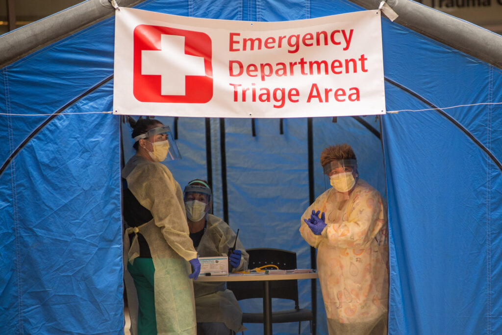 Medical staff inside a tent outside Boston Medical Center for intake of potential coronavirus patients